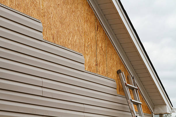 Professional Emergency Siding Repair technician working in Summerfield, MD